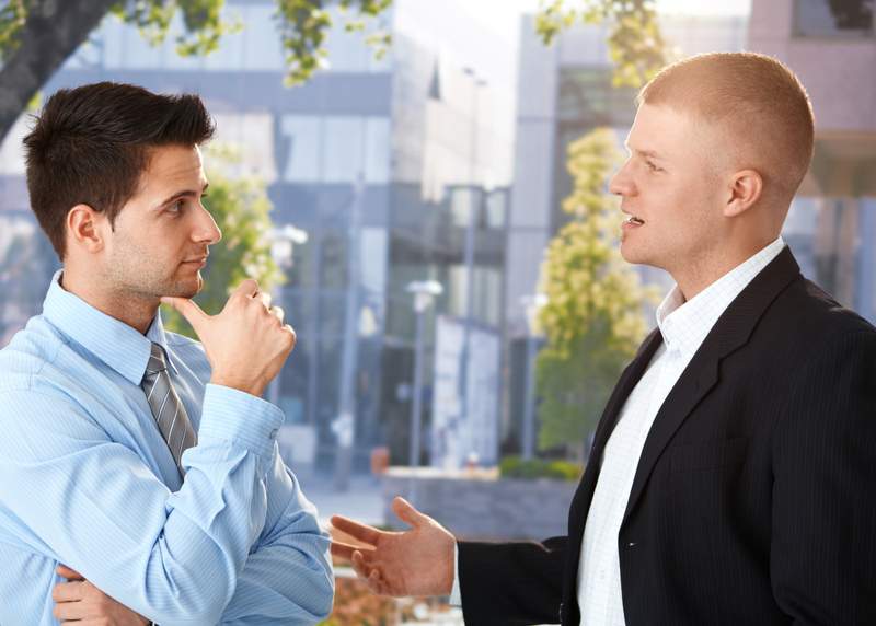 Businessmen in Conversation