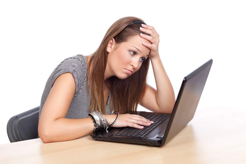 depressed girl at computer